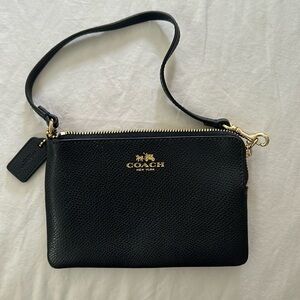 Tiny navy blue Coach bag